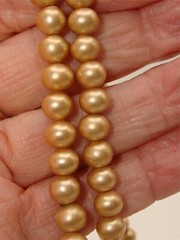 VINTAGE “Andrea” CHAMPAGNE FAUX PEARL NECKLACE 56″ IN O.B.!