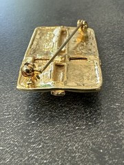 VTG Shiny Gold-tone AAi Signed Rapped Gift Box Brooch Red Gem