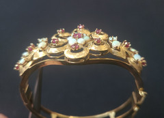 Spectacular Victorian 14K Yellow Gold Bangle Bracelet w/ Rubies and White Opals.