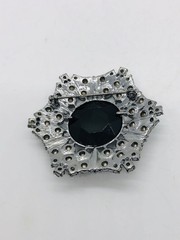 Rhinestone brooch with central black rhinestone
