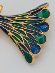 Vintage Peacock Brooch with enamel work and gold-tone accents.