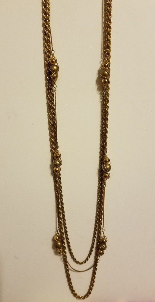 Vintage multi strand cage bead necklace in rich matte goldtone.