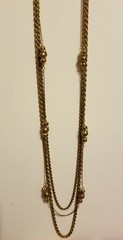 Vintage multi strand cage bead necklace in rich matte goldtone.