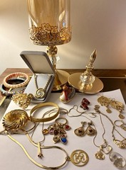 Elegant Vintage Goldtone Jewelry In Art Deco design Container