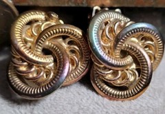 Vintage Costume jewelry clip on earrings 1980s 1990s Iridescent Gold Tone Knots