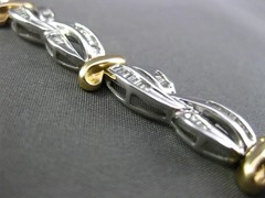 ESTATE 2.0CT BAGUETTE DIAMOND 14KT WHITE & YELLOW GOLD INFINITY TENNIS BRACELET