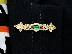 0.93ct Emerald, 0.24ct Ruby and 1.04ct Diamond, 18ct Yellow Gold Brooch