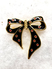 Vtg gold tone enamel Polka Dot Bow Pin