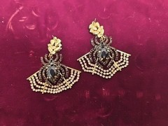 Costume jewelry earrings titled ‘Spider Rhinestone Earrings’ by Piper K