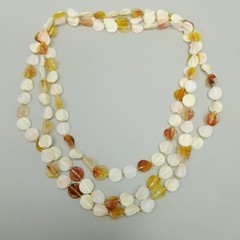 Vintage Long Single Strand Orange and Cream Beaded Necklace Plastic Leaf Shapes