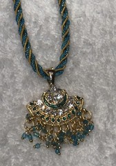 Vintage Indian Style, Gold, Toned Pendant necklace, Twisted Teal Silk Dori Cord