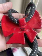 Vintage flying colors signed ceramic red bow Black Cord necklace