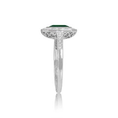 A Rare Colombian Emerald and Lab Created Diamond Halo 925 Sterling Silver Ring