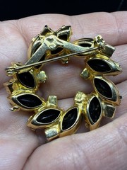 Opaque Black Rhinestone And Gold Toned Circle Wreath With Navette Vintage Brooch