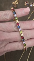 gold-toned jewelry set featuring multicolored gemstones Lot Of 11