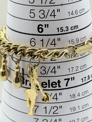 Vintage Gold Tone Women’s Bowling Charm Bracelet. 6.25in 15.9cm Fold Over Clasp