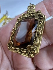 32 in.³ triple strand Goldette amber colored faceted glass necklace