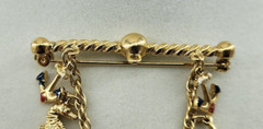 Unbranded Gold Tone Brooch Bar With Chain and 7 Nautical Themed Charms