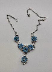 Vintage 1959 rhodium-plated necklace / blue thermoset flower and rhinestones