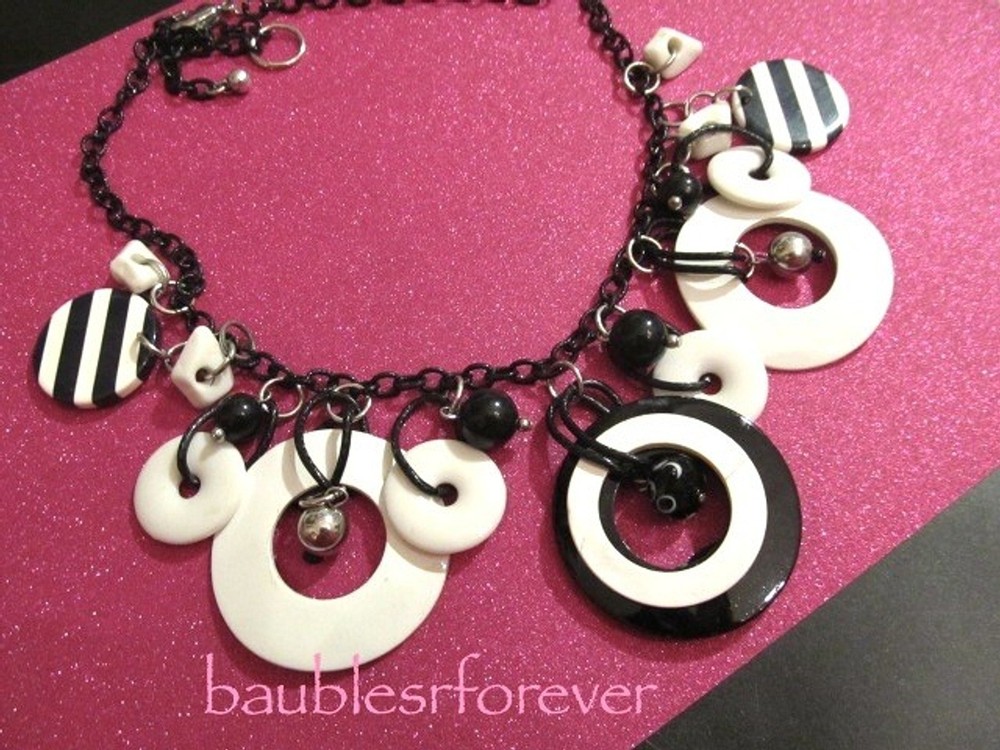 1980s Lucite & Metal Disk Charms Bells Glass Beads Necklace Black Enamel Chain