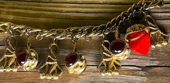 1950’s Gold tone Red Glass Gripoix charm bracelet 7.5 charms measure 1″ x 0.66″