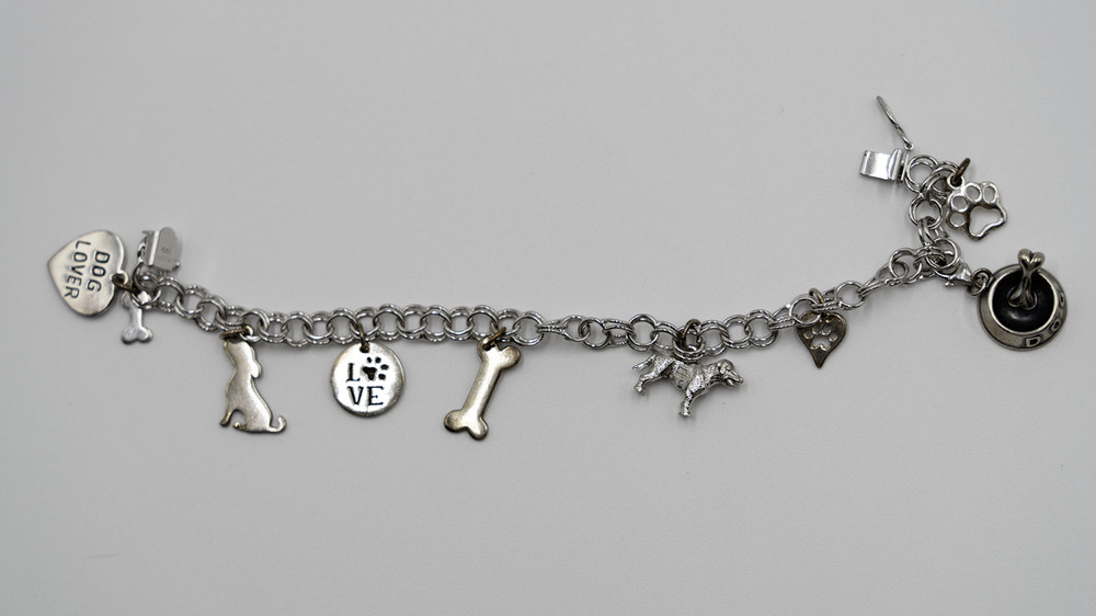 Vintage Sterling silver 925 dog bracelet with nine charms from 1995-1996