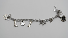 Vintage Sterling silver 925 dog bracelet with nine charms from 1995-1996