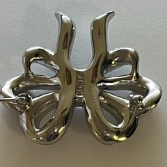 Vintage Monet Clear Rhinestones Bow Brooch Silver Tone Emerald Cut Center Stone