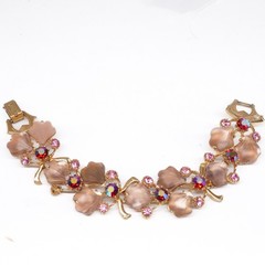 VTG bracelet Molded Glass Leaves AB Pink Rhinestones in Goldtone fold over clasp