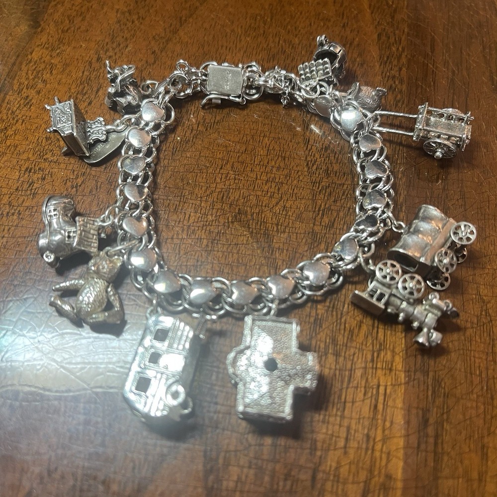 Vintage American Staring Heart Charm Bracelet 11 Charms Articulating 54.6 G 7.5”