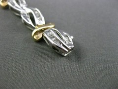 ESTATE 2.0CT BAGUETTE DIAMOND 14KT WHITE & YELLOW GOLD INFINITY TENNIS BRACELET