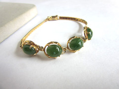 Vintage gold tone herringbone chain with 4 faux jade cab stones bracelet