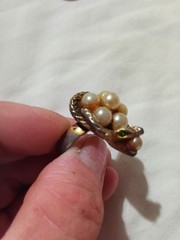 vintage snake ring with cultured pearls and small green emerald eyes.
