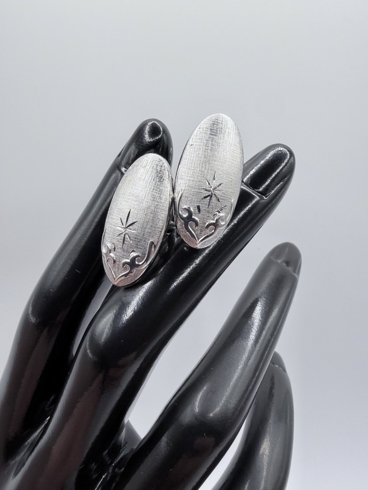 Swank Silver Tone Oval Metal Cufflinks Star Engraving Bullet Back
