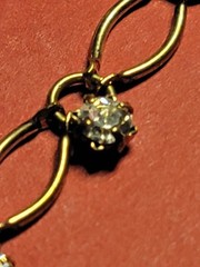 Vintage Avon Bracelet open pinched oval links light gold tone clear rhinestones.