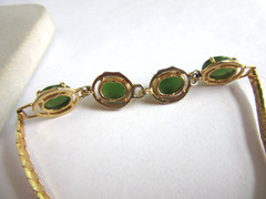 Vintage gold tone herringbone chain with 4 faux jade cab stones bracelet