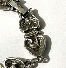 Vintage Silver Tone Avon Bracelet with Hearts and Pink Rhinestones 6.75 in.