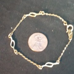 Vintage Signed Avon Gold Tone Rope Bracelet w Twirl Accents 6-7/8inch
