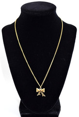 Vintage Gold Tone Necklace & Bow Shaped Pendant with Red Rhinestone