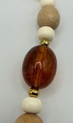 Vintage off white light wood and brown marbled amber colored beaded necklace