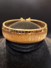 Monet gold tone bracelet with safety chain w/shiny and matte finish