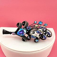 Vintage Rhinestone Brooch Aqua Blue Aurora Borealis Floral Bouquet Pot Metal?