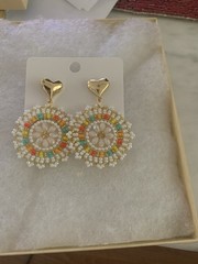 Handmade beaded earrings with post drop pierced.