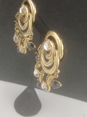 Signed CRAFT Goldtone intertwined circles black clear stones dangle earrings
