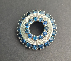 Vintage Small Silver Tone Circle Brooch With Dark Blue Rhinestones