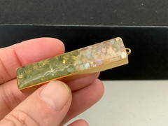 Vintage gold plated genuine Opal Peridot nuggets in resin bar pendant 0.5” x 2”