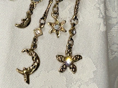 Gold Tone Crescent Moon With Dangling Stars, Cupid, Moon, Rhinestones Brooch