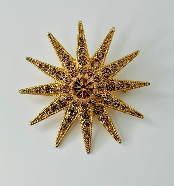 Vintage Sparkly Starburst Brooch Signed Graziano Gold Base With Topaz Rhinestone