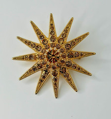 Vintage Sparkly Starburst Brooch Signed Graziano Gold Base With Topaz Rhinestone