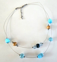 Blue Glass Wood & Acrylic Floating Bead Floating Silver Tone Necklace 17.75″ Adj